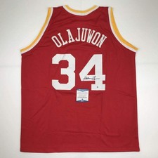 Autographed/Signed Hakeem Olajuwon Houston Red Jersey Beckett COA picture